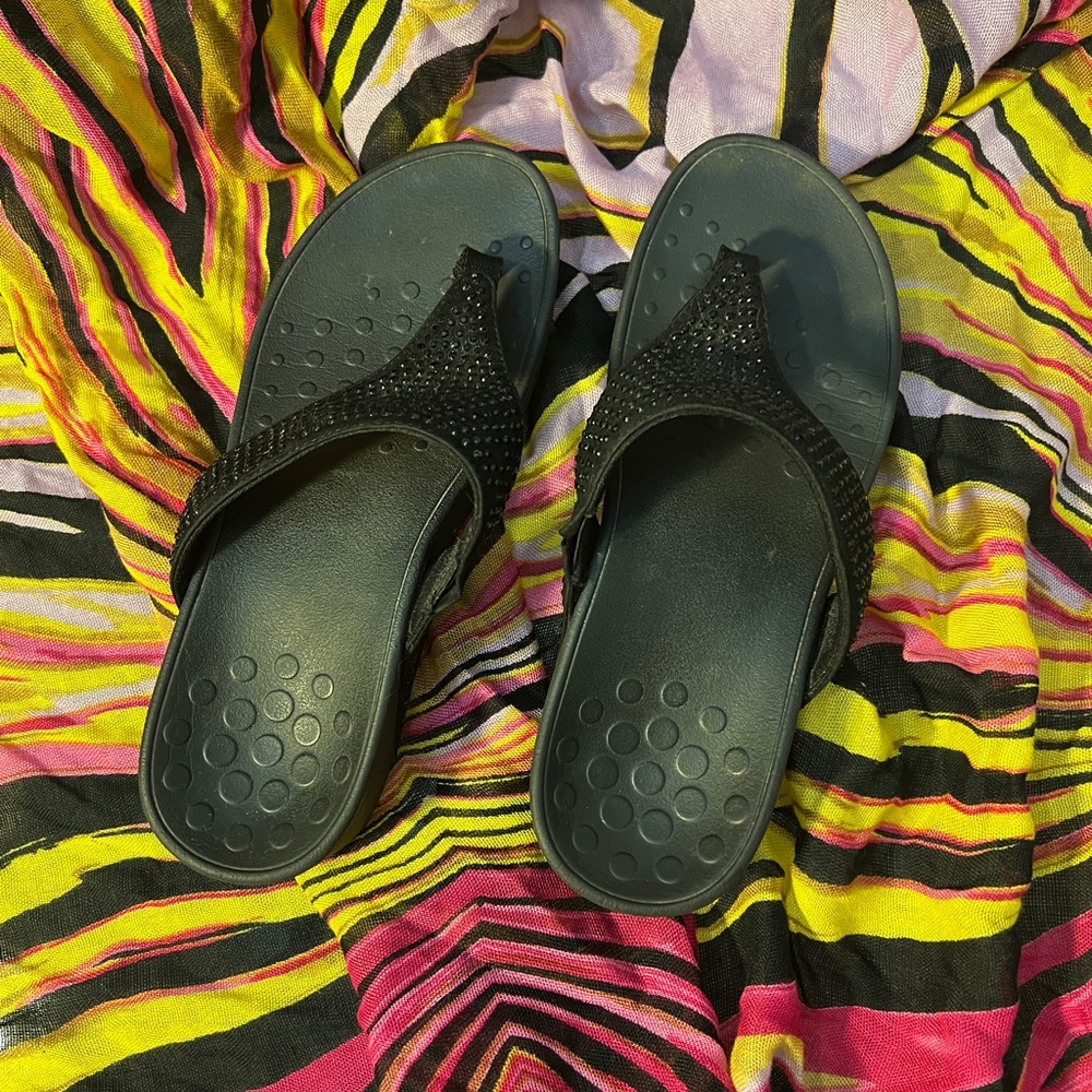 Black Vionic sandals.